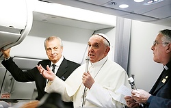 The pope spent 80 minutes answering questions from 21 journalists on the plane.  (CNS photo/Paul Haring) 